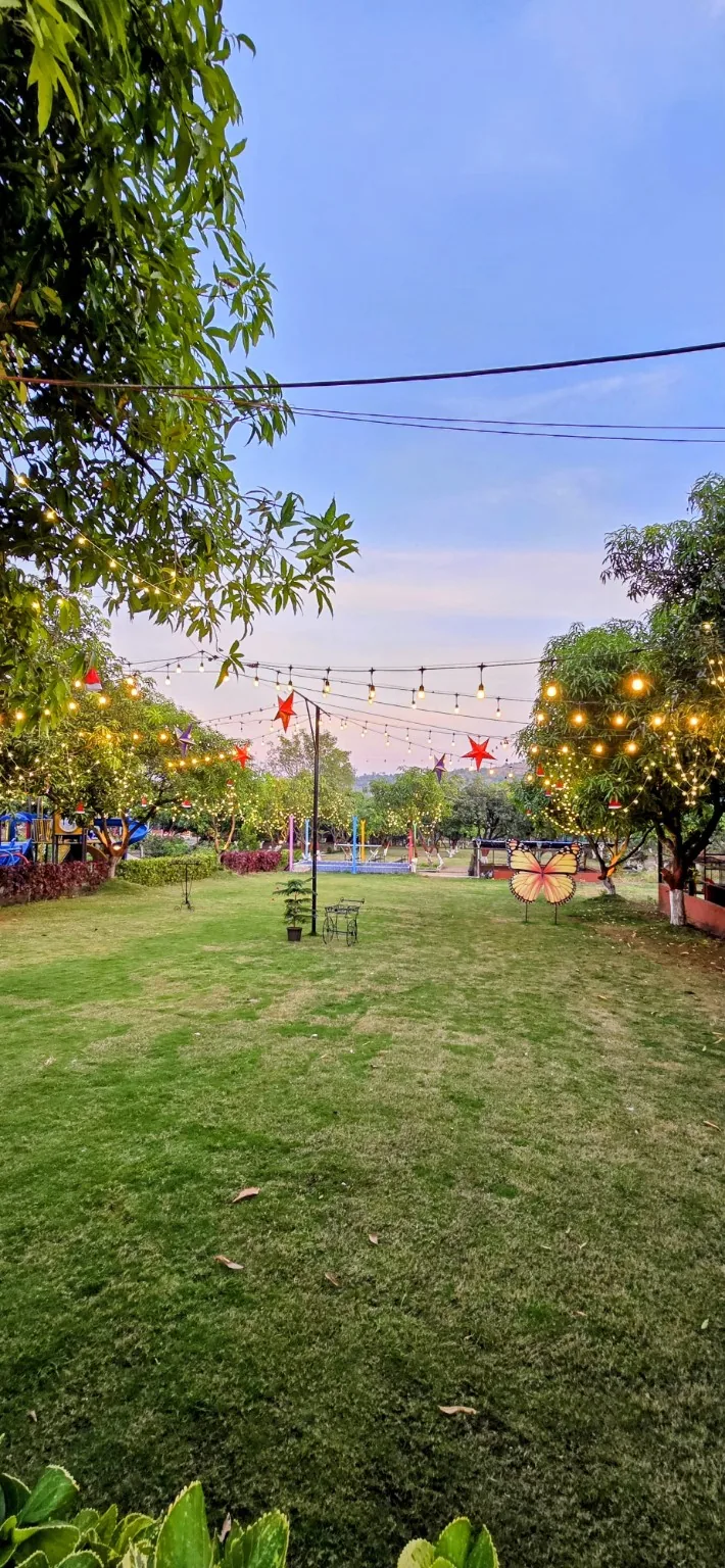 Raj Farm Stay Resort evening garden
