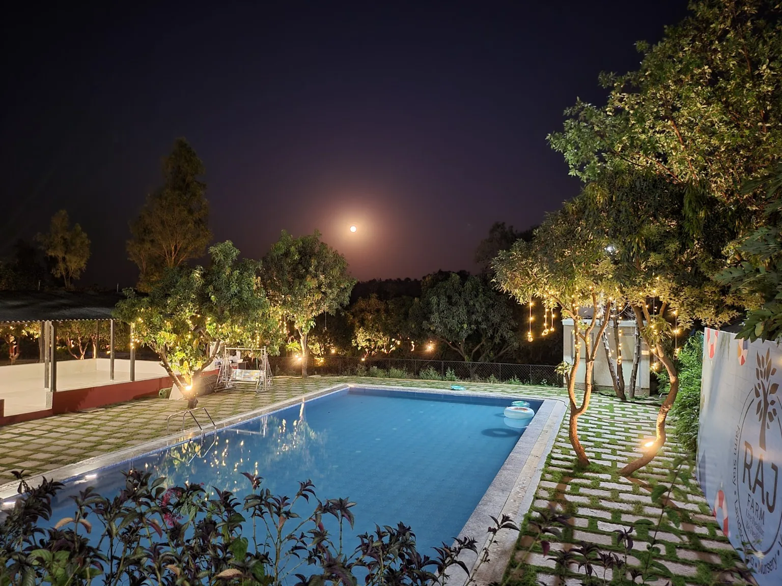 Raj Farm pool at night